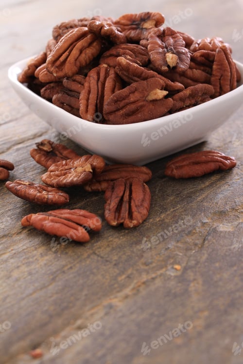 Preview: Healthy Pecan Nut Halves In White Dish