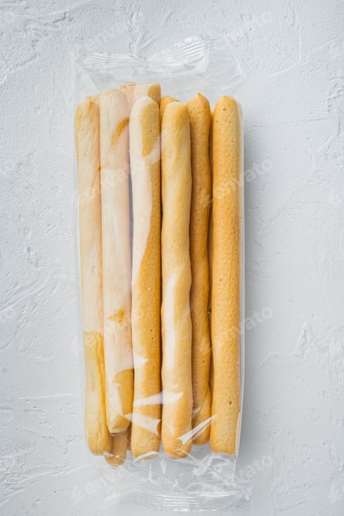Preview: Grissini, With Olive Oil, On White Background, Flat Lay