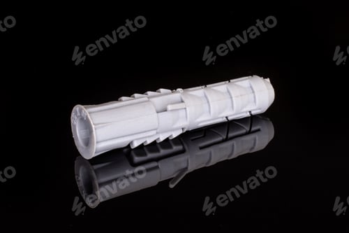 Preview: One Whole Plastic Light Grey Wall Plug Work Item Isolated On Black Glass