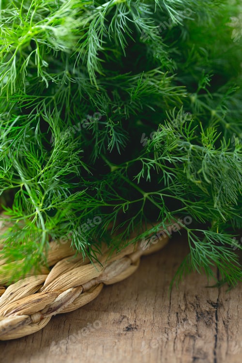 Vista previa: Bunch Of Dill On Wooden Surface