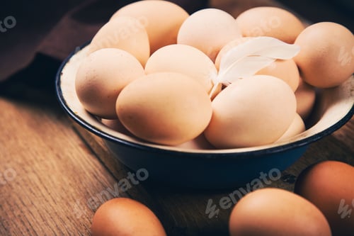 Preview: Many Fresh Healthy Brown Eggs In Old Blue Dish