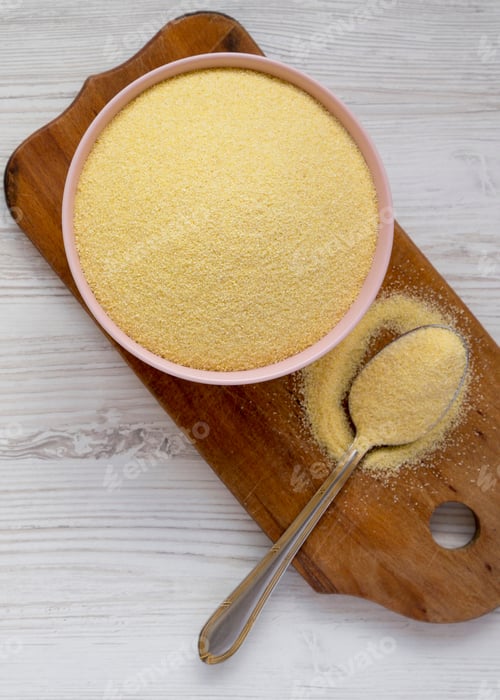 Preview: Overhead View, Dry Semolina Durum Flour In A Pink Bowl Over White Wooden Surface. Top View, From