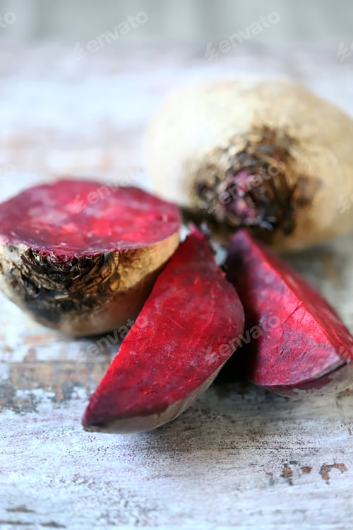 Preview: Beets On A Wooden Surface. Red Beets Whole And Sliced. Selective Focus. Macro. Copy Space.