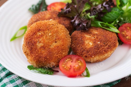 Preview: Small Chicken Cutlet With Vegetables On A Plate