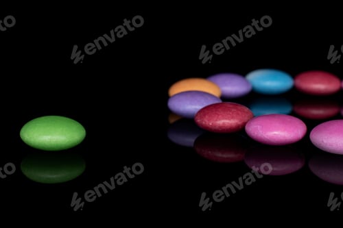 Preview: Lot Of Whole Sweet Colourful Candy Green Separated Isolated On Black Glass