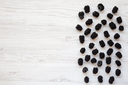 Preview: Blackberries On White Wooden Background, Top View. Summer Berry. From Above, Overhead. Copy Space.