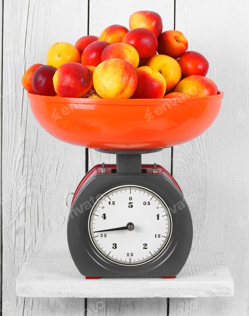 Preview: Apricots On Scales On A Wooden Shelf.