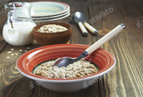 Preview: Porridge In Orange Bowl On The Table