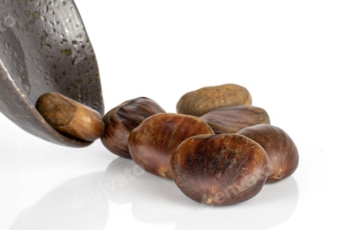 Preview: Group Of Seven Whole Edible Brown Chestnut In Glazed Bowl Isolated On White Background