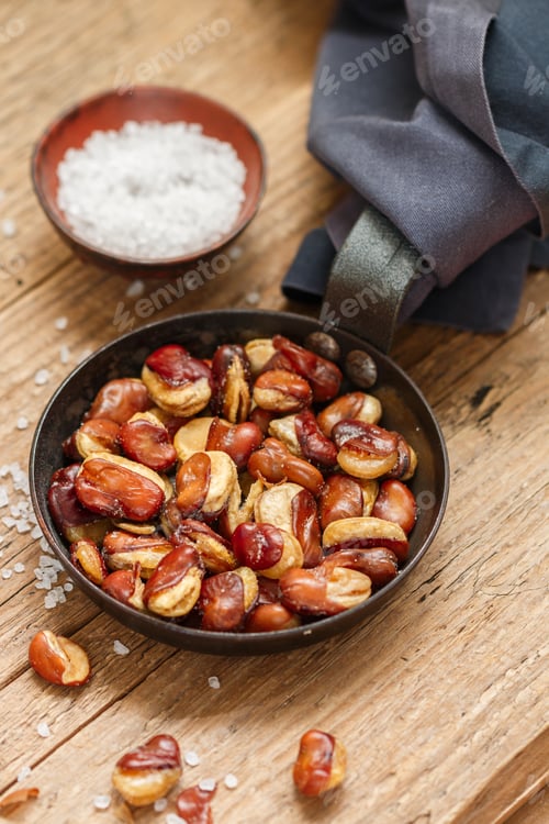 Preview: Vicia Faba. Crispy Fried (Roasted) Broad Beans With Salt In A Frying Pan Close-Up On A Wooden Old