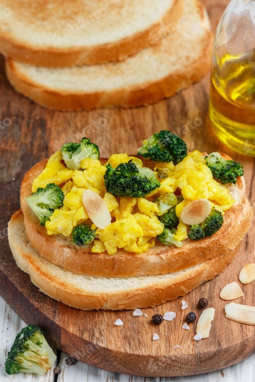 Preview: Bread Toast With Egg Salad, Broccoli And Almond Petals. Bruschetta. Delicious Breakfast. Selective