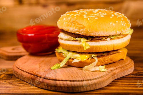 Preview: Hamburger And Sauce On Rustic Wooden Table