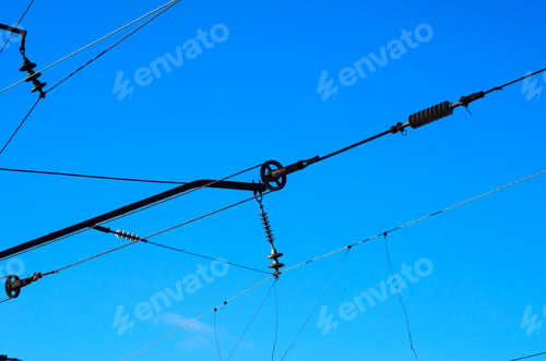 Preview: Railway Overhead Electric Lines Against Blue Sky