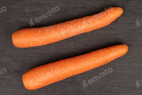 Preview: Group Of Two Whole Fresh Orange Carrot Flatlay On Grey Stone