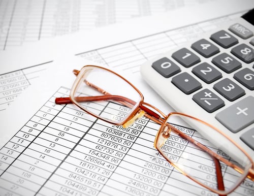 Preview: Glasses And The Calculator On Documents.