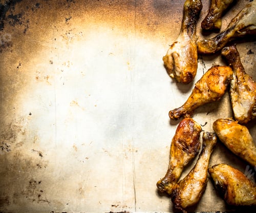 Preview: Fried Chicken Legs . On An Old Rustic Background.