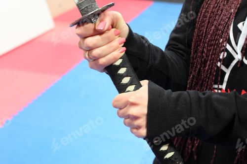 Preview: Samurai Sword Katana In Girls Hand. Japanese Sword (Katana Sword) Holding In Samurai Hand Prepare