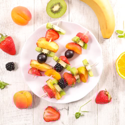 Preview: Colorful Fruit Kebabs on a White Plate