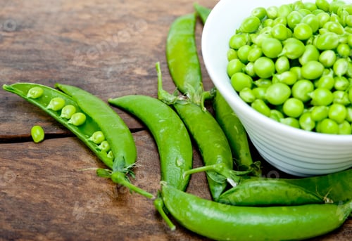 Preview: Hearthy Fresh Green Peas Over A Rustic Wood Table