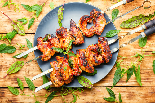 Preview: Shashlik With Nettle Marinade.Meat On Skewers,Barbecue.Shish Kebab On Wooden Background