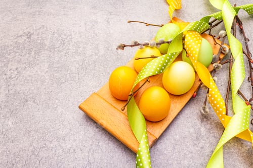 Preview: Easter Eggs, Willow Seals Branches, Polka Dot Satin Ribbons. Concept On A Wooden Stand On A Stone