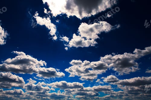 Preview: Blue Sky With White Clouds Background