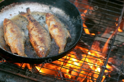 Preview: Fish Frying In Oil On The Fire
