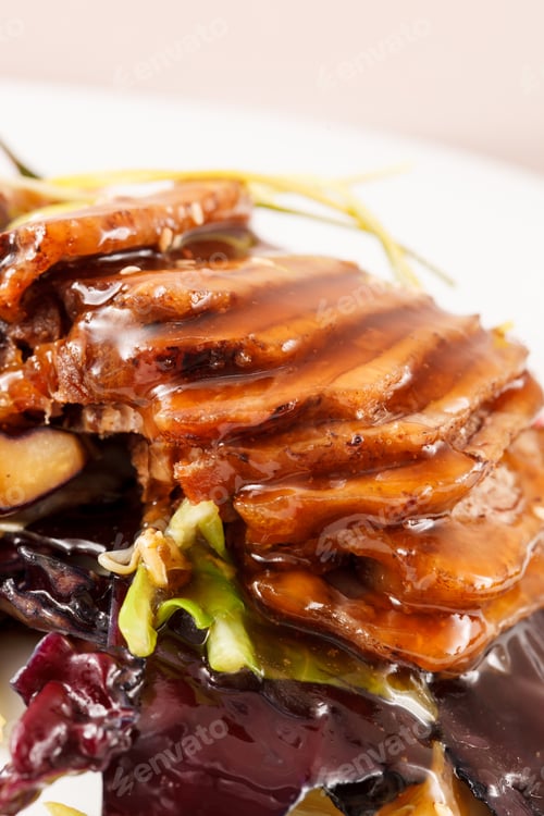 Delicious Slices of Meat with Shiny Glaze