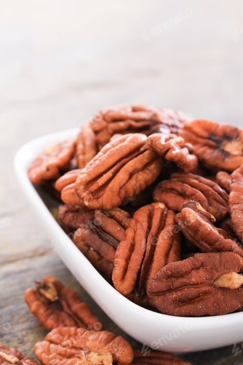 Preview: Healthy Pecan Nut Halves In White Dish