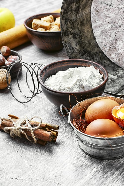 Preview: Basic Baking Ingredients For Cooking.Eggs,Brown Sugar And Wheat Flour.