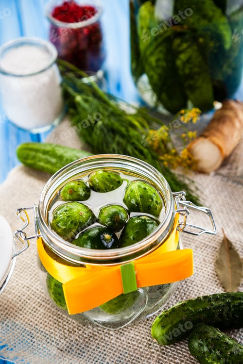 Preview: Raw Cucumbers, Horseradish On Wooden Background
