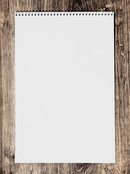 Preview: Notebook On A Wooden Background.