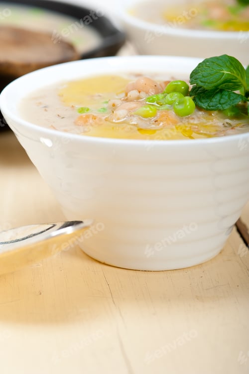 Preview: Hearty Middle Eastern Chickpea And Barley Soup With Mint Leaves On Top