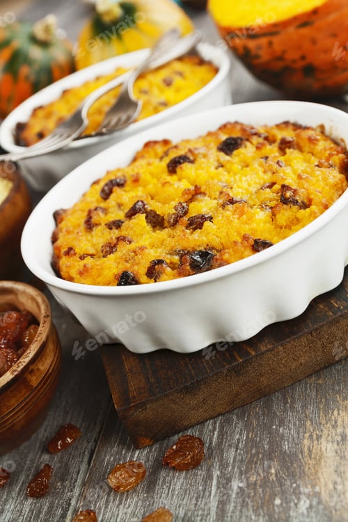 Preview: Pumpkin Casserole With Millet And Raisin On The Wooden Table