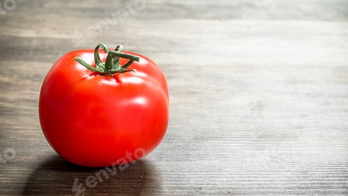 Preview: Fresh Ripe Tomato. On A Wooden Table.