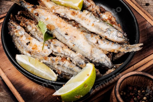Preview: Fish Fried Breaded On Iron Cast Pan.Deep-Fried Fish
