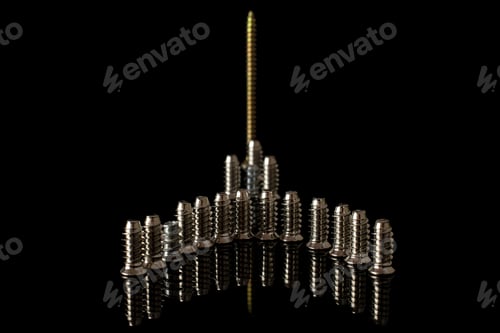 Preview: Group Of Seventeen Whole Metallic Glossy Bolt Building Isolated On Black Glass