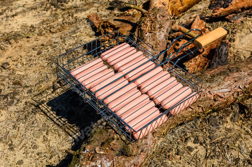 Preview: Raw Sausages In Barbecue Grill Before Cooking