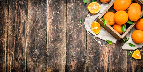 Preview: Fresh Oranges In An Old Box. On Wooden Background.