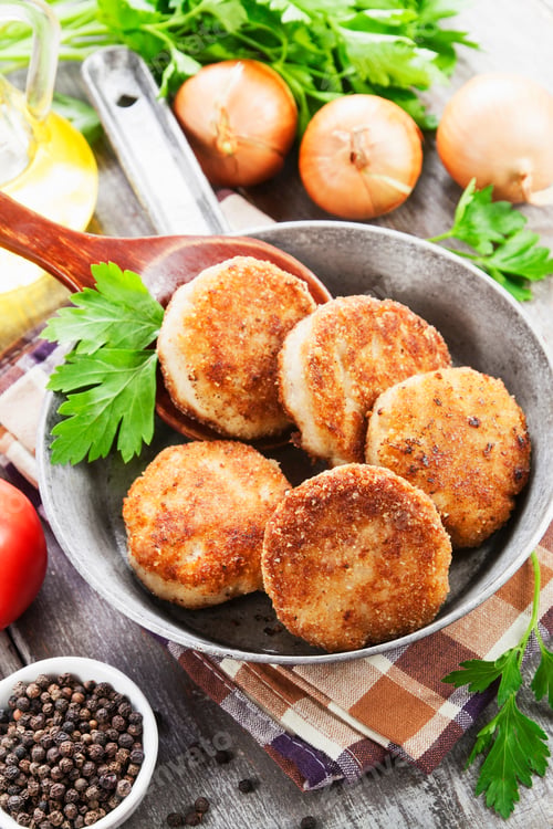 Preview: Burgers In The Pan On The Wooden Table