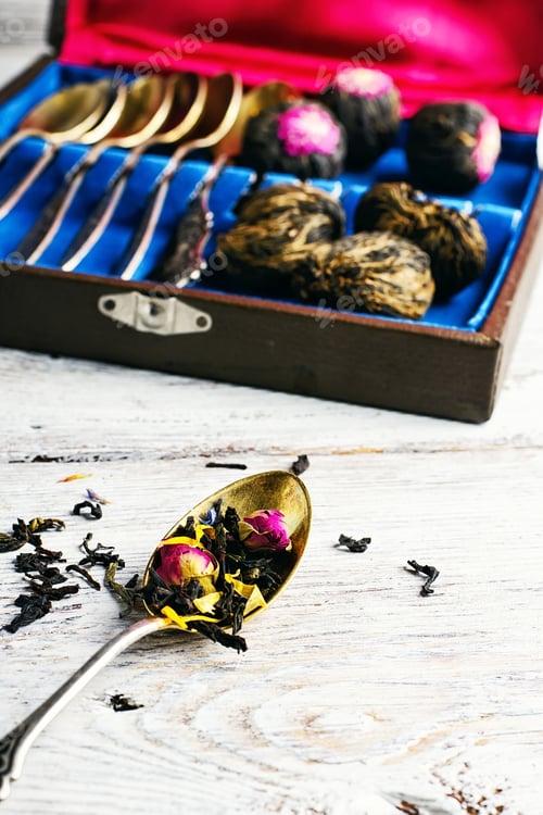 Preview: Aromatic Teas And A Set Of Spoons On A Light Background