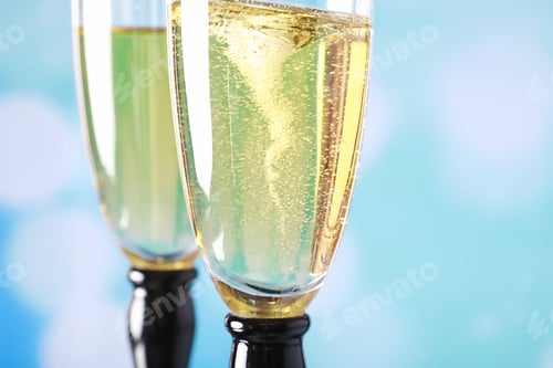 Preview: Background With Tall Glasses For Sparkling Wines. Champagne Spray In Glass Glasses. Celebratory