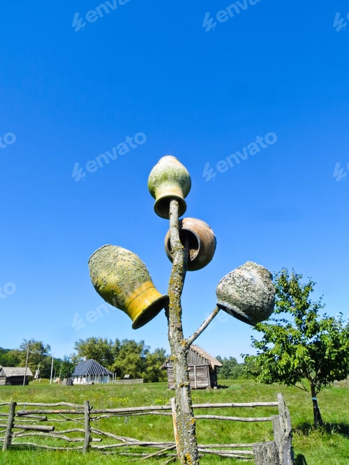 Preview: Old Traditional Ukrainian Clay Pots On A Fence