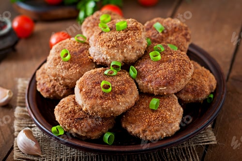 Preview: Juicy Delicious Meat Cutlets On A Wooden Table In A Rustic Style. Selective Focus