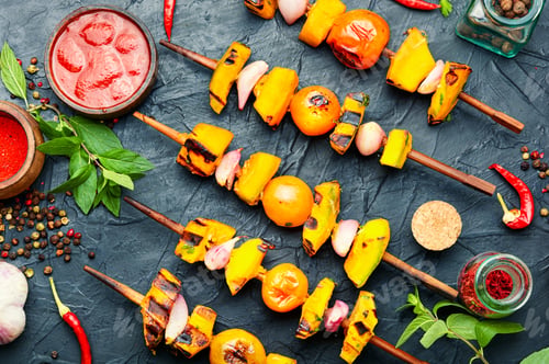 Preview: Vegetarian Pumpkin And Yellow Tomato Kebabs. Pumpkin Fried On Skewers.