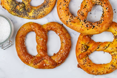 Preview: Pretzel. A Set Of Different Pretzels With Black And White Sesame, Poppy Seeds, Cumin Or Caraway