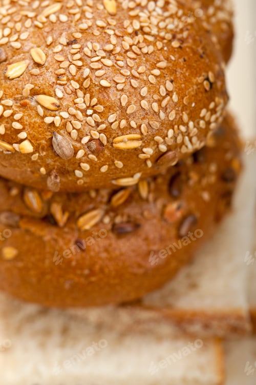 Preview: Fresh Organic Bread Over Rustic Table Macro Closeup