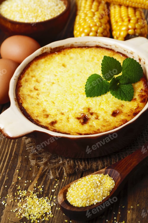 Preview: Casserole Of Polenta On The Wooden Table