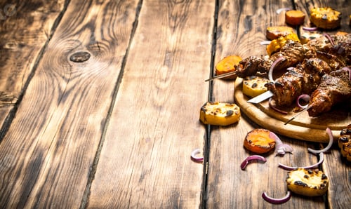 Preview: Shish Kebab With Grilled Vegetables. On Wooden Background.