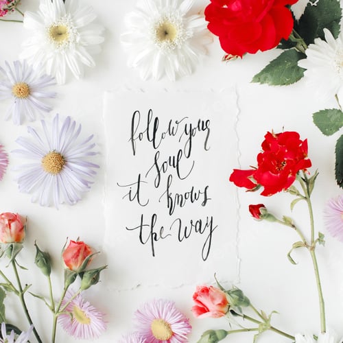 Preview: Inspirational Quote "Follow Your Soul It Knows The Way" Written In Calligraphy Style On Paper With